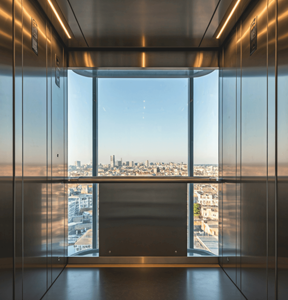 Modern elevator with panoramic city view